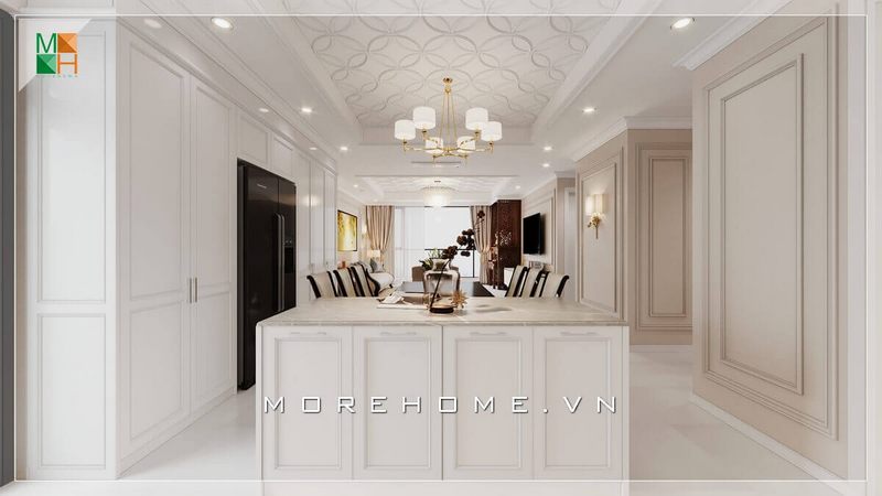 Không gian bếp liền phòng ăn nơi đây được tôn vẻ đẳng cấp bởi mẫu đảo bếp tân cổ điển với sắc trắng lịch lãm và ấn tượng sang trọng.