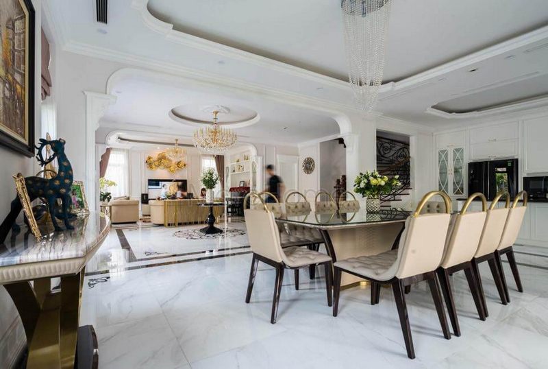 Bộ bàn ăn 10 ghế tân cổ điển được bọc da sang trọng và được thiết kế đặc biệt dành riêng cho các biệt thự.