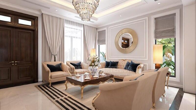 Cửa chính 2 cánh của phòng khách được trang trí bằng đường vân đẹp mắt và gam gỗ óc chó tự nhiên cao cấp mang đến sự độc đáo.