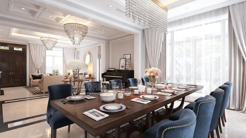 Sắp xếp phòng ăn liền phòng khách đẹp, sang trọng ấn tượng với sắc xanh nổi bật từ bộ bàn ghế cùng lối thiết kế nội thất tân cổ điển quý phái.
